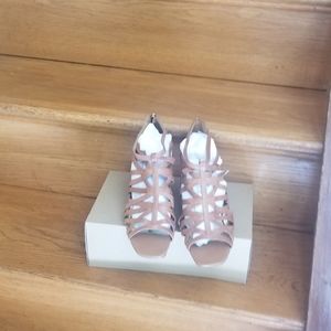 A pair of high heel sandals